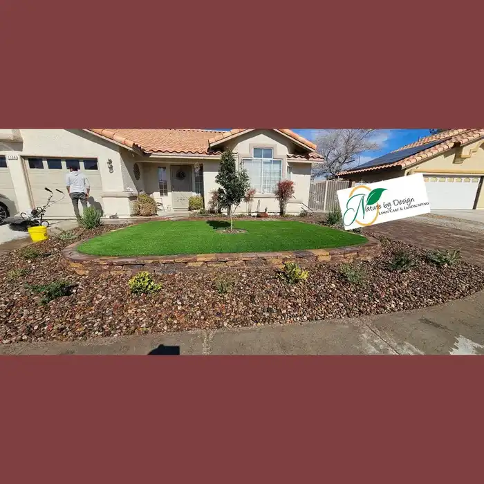 Front yard turf circle with paver border and desert planting